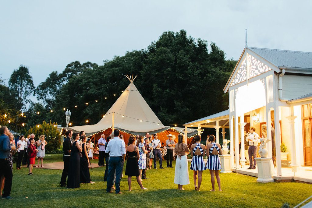 Backyard tipi wedding under tree with food truck